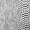 Tissu simili cuir reptile uni gris clair pour l'ameublement, le loisir créatif, le recouvrement de canapé, siège, fauteuil, coussin, tête de lit, la création de sac, pochette, accessoires de mode et de décoration