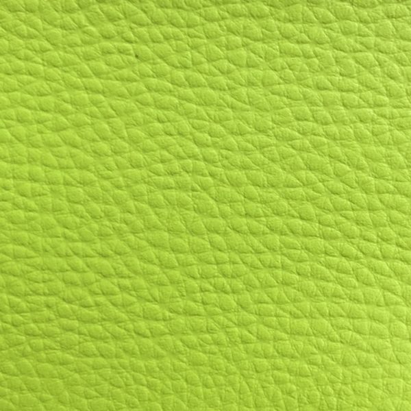 Tissu simili cuir skaï uni vert anis pour le recouvrement de canapé, siège, fauteuil, coussin, tête de lit et pour la création de sac, pochette, accessoires de mode et accessoires de décoration